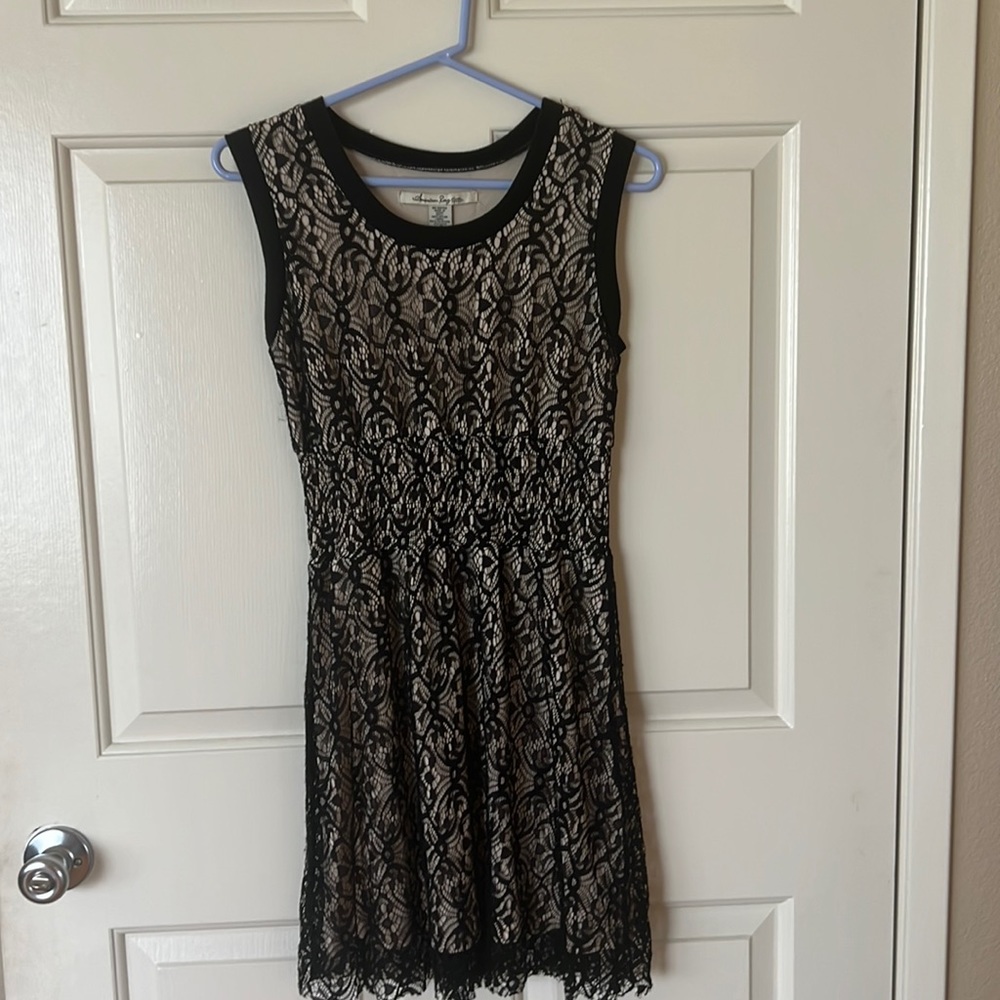 Black Lace Dress over nude slip.